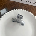 Translucent dark grey mini hair claw clip with sphere design on ceramic plate - Light Gray