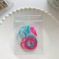 Colorful hair accessory set with elastic bands and metal clips in a clear pouch - Large Scrunchies And Hair Clips Combination