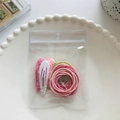 Sparkly pink sequin hair clips and elastic hair ties set in clear packaging bag - Large Sequins Scrunchies And Hair Clips
