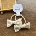 Cream lace bow hair ties in a two-piece set with elastic bands on wooden background - Fabric Bow / Two-Piece Set