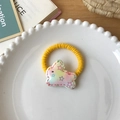 Élastique à cheveux jaune avec un charmant lapin holographique et motifs d'étoiles - Élastique Lapin Étoile