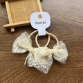 Pair of elegant beige lace bow hair ties for children on original display card - Sand Edge Bow / Two-Piece Set