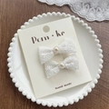 Set of two white lace bow hair clips with faux pearls and floral details for girls - Diagonal Bow Pearl
