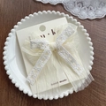 Handmade cream white lace bow hair clip with organza layers on display card - Large Lace Bow