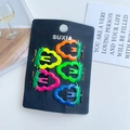 5-piece set of vibrant gradient fruit-shaped hair clips on a black presentation card - Grape Orange and Yellow