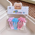 Set aus 4 süßen Cartoon-Haarspangen mit beweglichen Augen in Rosa Blau Lila und Beige - Oktopus Serie Rosa & Blau