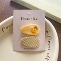 Set of two yellow fabric hair clips with embroidered orange and checkered pattern - Orange