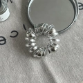 Transparent spiral hair tie with metallic silver pearls and traceless resin design - White Pearl Style
