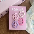 Lindo set de cuatro horquillas de flores en tonos pastel rosa y violeta para niñas - Flor
