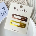 Lot de deux barrettes rectangulaires en métal mat de couleur marron foncé et jaune vif - Or et Brun