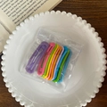 Set of 10 colorful matte metal snap hair clips for girls in vibrant assorted candy colors - Oval Design