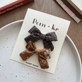 Brown floral and plaid fabric bow hair clips set on a ceramic plate with vintage props - Brown Plaid And Floral Style