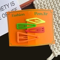 Set di fermagli per capelli opachi in giallo neon, verde, rosa e arancione su scheda - Giallo e Verde