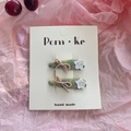 Barrettes à cheveux avec nœud rose et étoile blanche sur base tissée verte - Système Vert