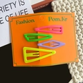 Matte triangle hair clips set in pink, green, purple and yellow on fashion card - Rose Red And Green