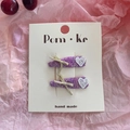 Lot de barrettes violettes avec nœud et cœur en dentelle sur fond de papier décoratif - Série Violette