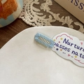 Mini light blue knitted dog hair clip for pets with a classic rectangular bb clip design - Blue Medium