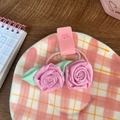 Pink fabric rose and leaf hair tie set on aesthetic checkered display plate - Purple-Red Rose