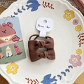 Deep brown bow hair tie with striped fabric texture and elastic band for ponytails - Coffee