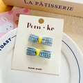 Sweet light blue sequin bow hair clips with yellow velvet center on display card - Blue Series