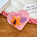 Cute star hair clip with purple eggplant charm on a pink heart display card for girls - Eggplant Style