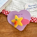 Cute yellow star hair clip with orange carrot detail on a pink snap barrette - Carrot Style
