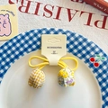 Coletero amarillo con colgantes de tulipán de tela y patrones de cuadros flores - Capullo De Tulipán Amarillo