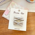 Beige satin bow hair clips with silver sequin stars on a premium display card - Khaki Bow Star Hair Clip