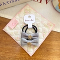 Lot de deux chouchous à nœuds en tissu gris avec étoile dorée pailletée et élastique noir - Élastique Nœud Étoile Bleu Gris