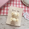 Paio di fermagli per capelli gialli a forma di caramella con perle su cartoncino - Stile Caramella Perla