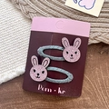 Paire de pinces à cheveux tissées grises avec oreilles de lapin pailletées roses - Lapin Pailleté Rose