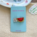 Sparkly sequin watermelon hair clip for girls on a light blue display card - Red Watermelon