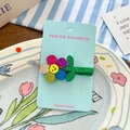 Pinza para el pelo con flor de purpurina y cara sonriente en tarjeta azul - Flor Multicolor