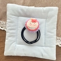 Handmade crochet bunny hair tie with pink and white yarn and black elastic cord - Pink Sunflower Rabbit