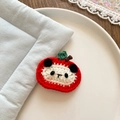 Handmade knitted panda apple hair clip for girls featuring red crochet and green leaf detail - Red