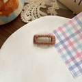 Retro style mini brown woven hair clip for dogs and women displayed on a ceramic plate - Light Brown (Large)
