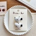 Set of two white heart hair clips with black polka dots on a stylish display card - White Heart Black Polka Dot Hair Clip
