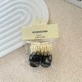 Set of 4 mini matte hair claws in cream and navy blue on elegant textured background - Small Hair Claw