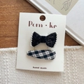 Black glitter bow hair clips set with pearls and plaid pattern on display card - Bow Pearl Edge Plaid (Style 3)