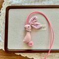 Pink fabric rabbit necklace with red plaid ears and delicate lace detail for kids - Pink Rabbit