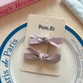 Set of two light purple pearlescent satin bow hair clips for girls on display - Taro Purple