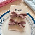 Pair of dark brown satin bow hair clips for kids on a cream display card for girls - Rose Pink