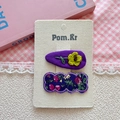 Set de horquillas para el pelo con flores púrpuras y girasol de ganchillo - Flor de Gota Morada