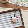 Detailed close-up of a white polar bear fabric pendant with a brown knitted scarf - Polar Bear Shape (NK1277)