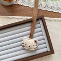 Close-up of a Hello Kitty style corduroy plush charm with brown hanging cord and bow - Cartoon Cat Shape (KT Cat Necklace) (5753606799027)