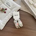 Detail of embroidered bear hair clips with pink hearts on a premium fabric display card - Hair Tie / Khaki Heart Bear Hair Tie