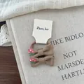 Detail of linen bow hair ties with strawberry embroidery and soft lace background - Khaki Bow Hair Tie