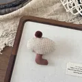 Detailed view of a handmade mushroom fabric brooch with polka dots on a rustic background - Beige Polka Dot (NK1452)