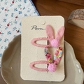 Sweet pink bunny ear hair clips for girls with floral patterns and soft pompom details - Pink Floral