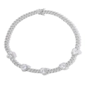 Macro shot of silver Cuban link necklace with five heart-shaped zircons and pave settings - Necklace / White Zircon Heart Silver